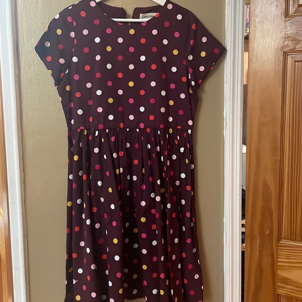 Kids dresses great for any function. Polka dot themed purple plus size .